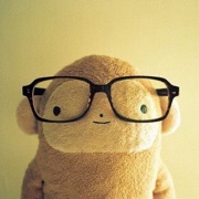 Tan Monkey W glasses