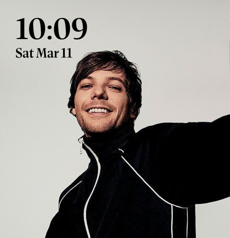 Louis Tomlinson with date and time 