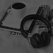 Coffee and headphones on the table